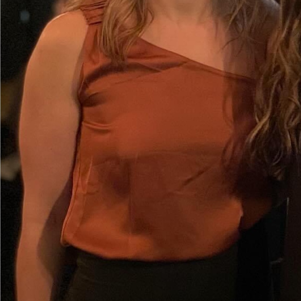 One shoulder top. Rust colored.